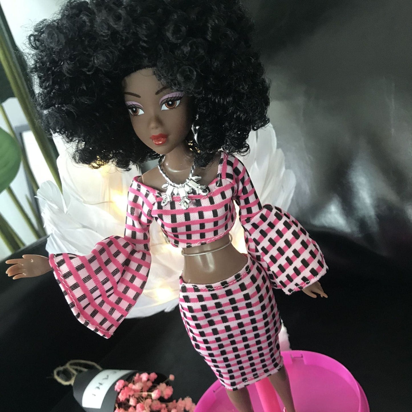 black articulated doll